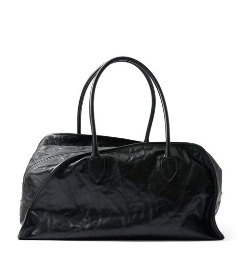 burberry black duffle bag|Burberry shield duffle bag.